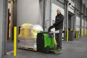 operator of a powered pallet truck in warehouse environment