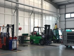 Forklifts being repaired in Angus's facilities